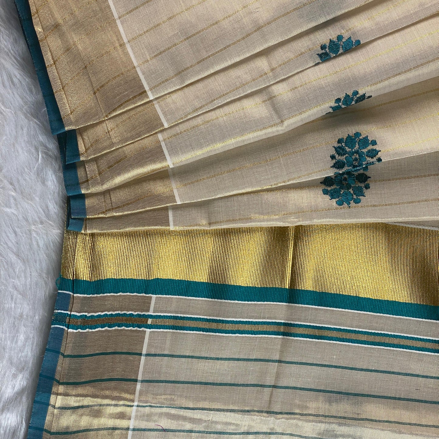 Kerala Saree with Body Full Striped Floral Embroidery Blue