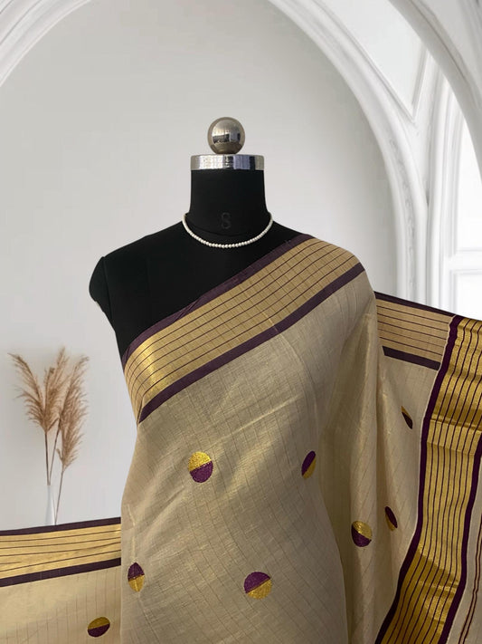 Shobana Uthradam Tissue Kerala Saree with Golden Lines and Butta work Purple