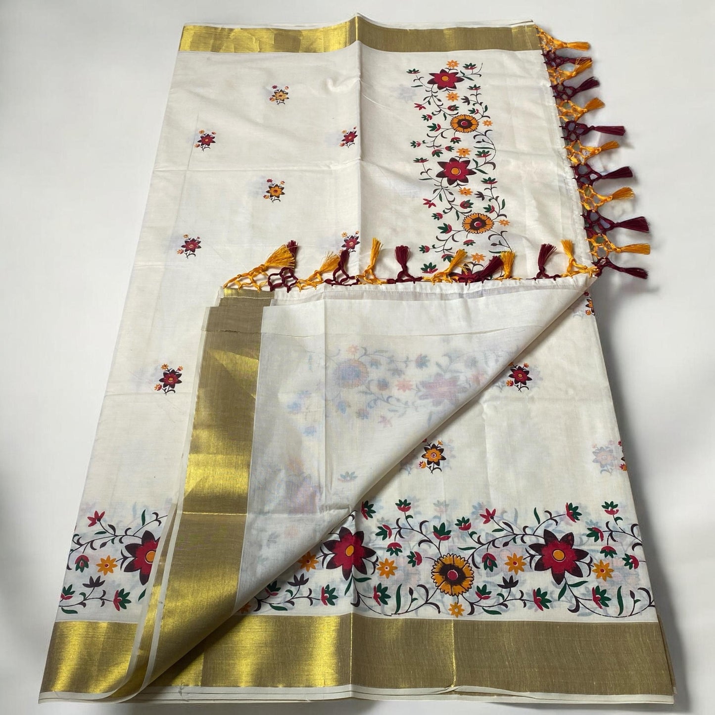 Radhika Floral Cotton Kasavu Saree