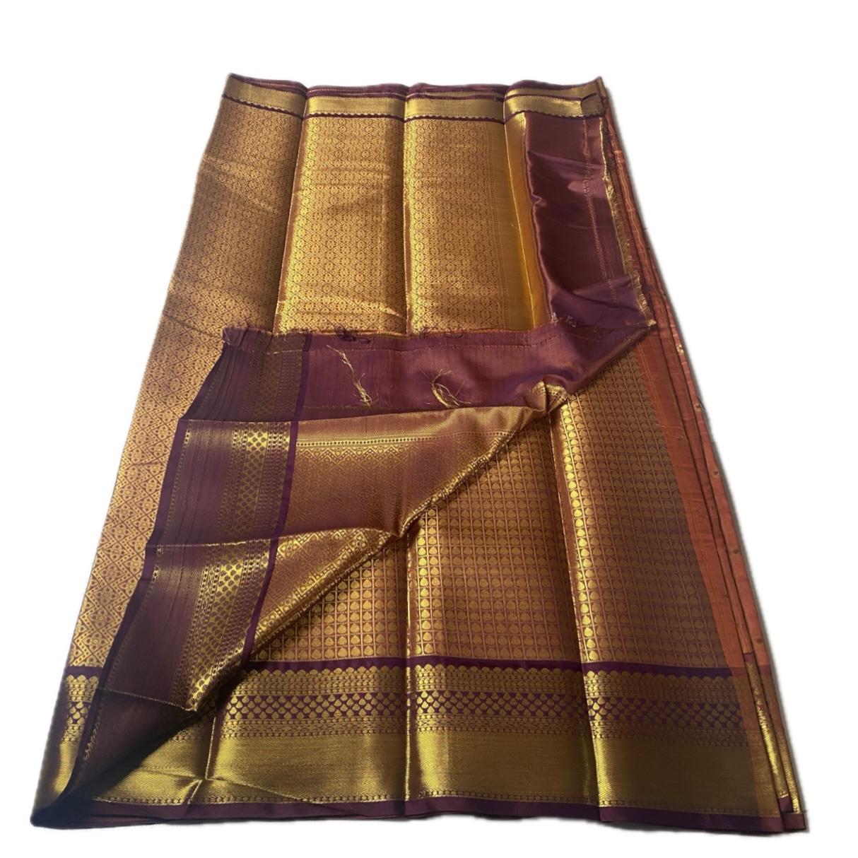 Krithika Rust Orange Checked Saree with Rich Zari Border