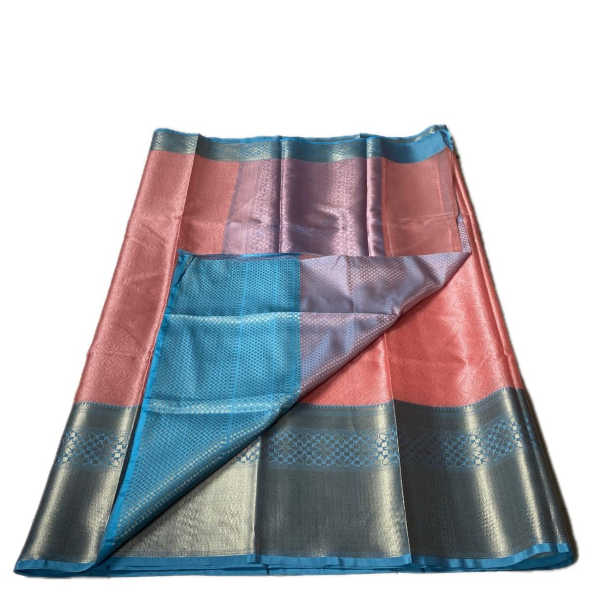 Devanshi – Premium Orange Silk Saree with Rich Blue Zari Border