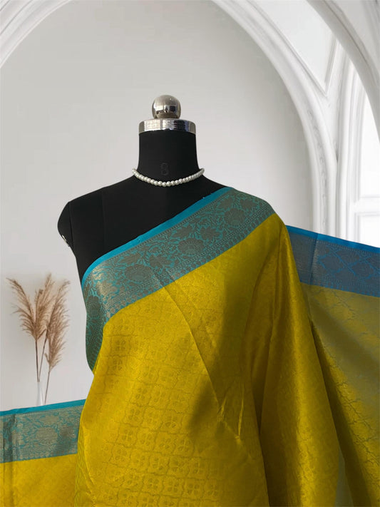 Devanshi – Premium Yellow Silk Saree with Rich Blue Zari Border