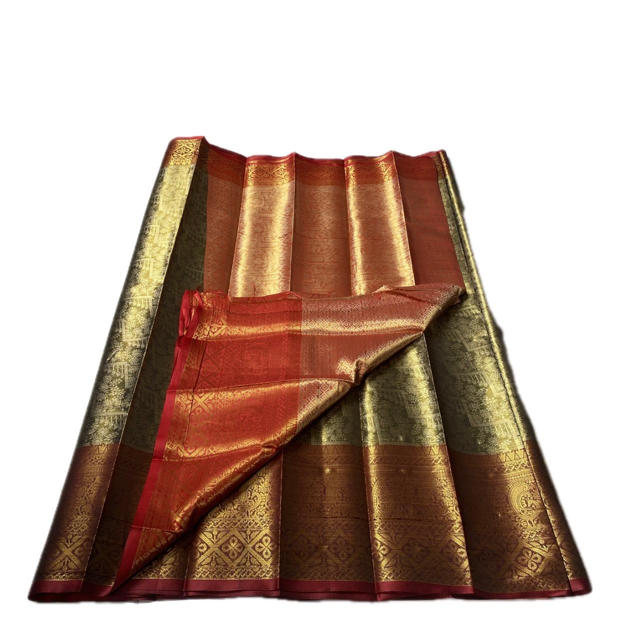 Panchali Warm Golden Glow Brocade Semi Silk saree in Green
