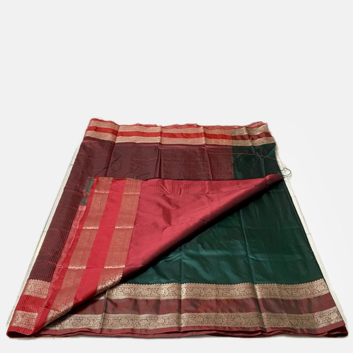 Ishani Green Semi Silk saree with Double Zari Border