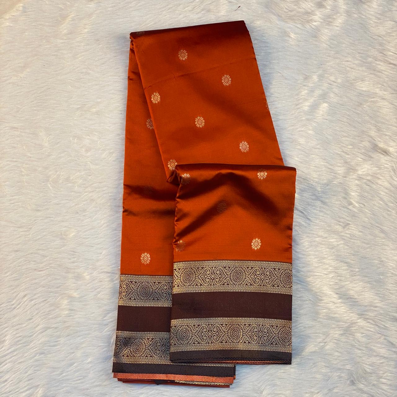 Khushbhu Burnt Orange Butti Silk Saree with Double Zari Border