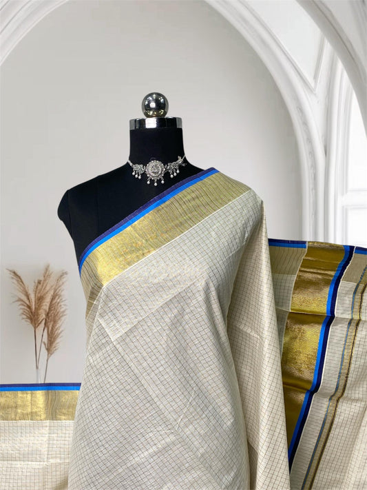 Revathi Checkered Kerala Kasavu Saree with Golden & Blue Border with Tassels