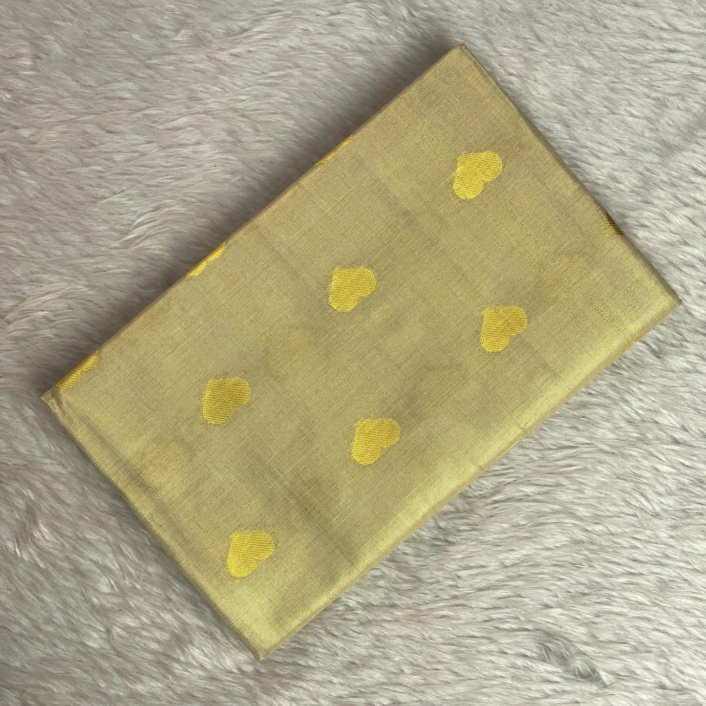 Kerala Style Cream Saree with Golden Jaggad Butta Design