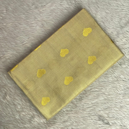 Kerala Style Cream Saree with Golden Jaggad Butta Design