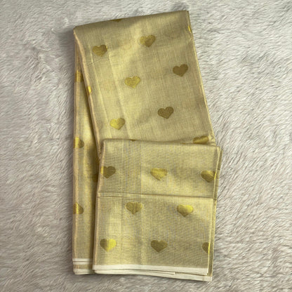 Kerala Style Cream Saree with Golden Jaggad Butta Design