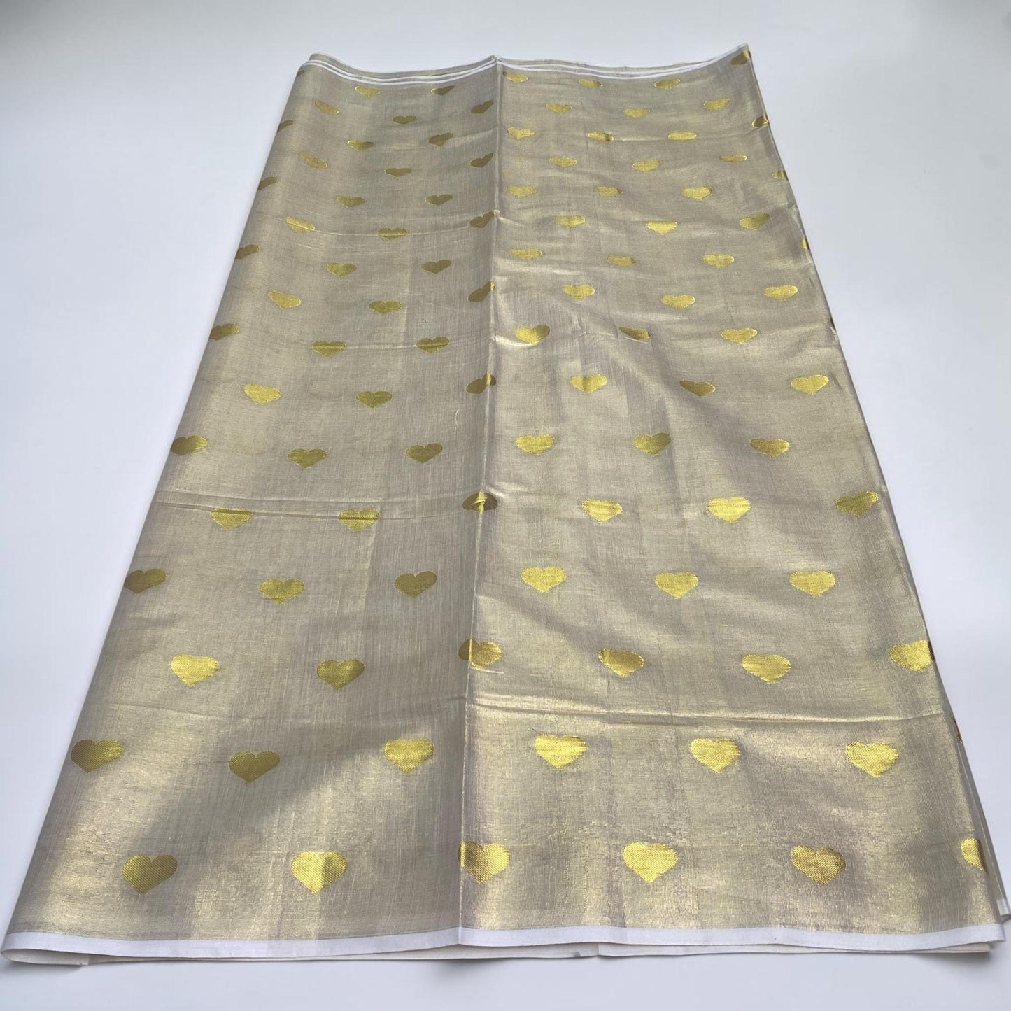 Kerala Style Cream Saree with Golden Jaggad Butta Design