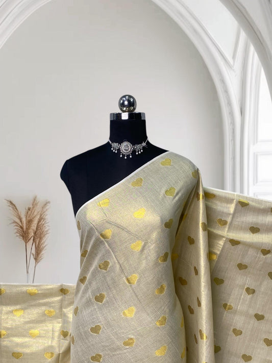 Kerala Style Cream Saree with Golden Jaggad Butta Design