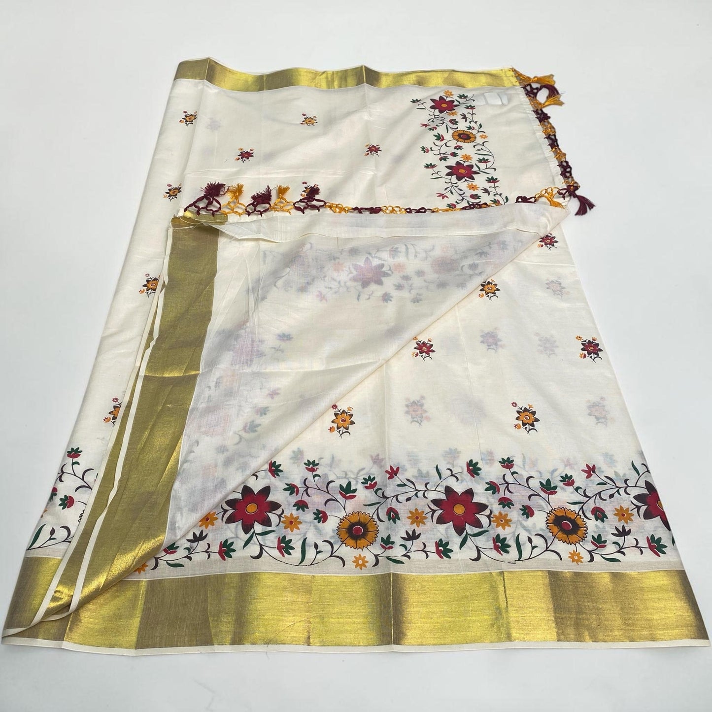 Kasavu Saree with Full floral Pattern