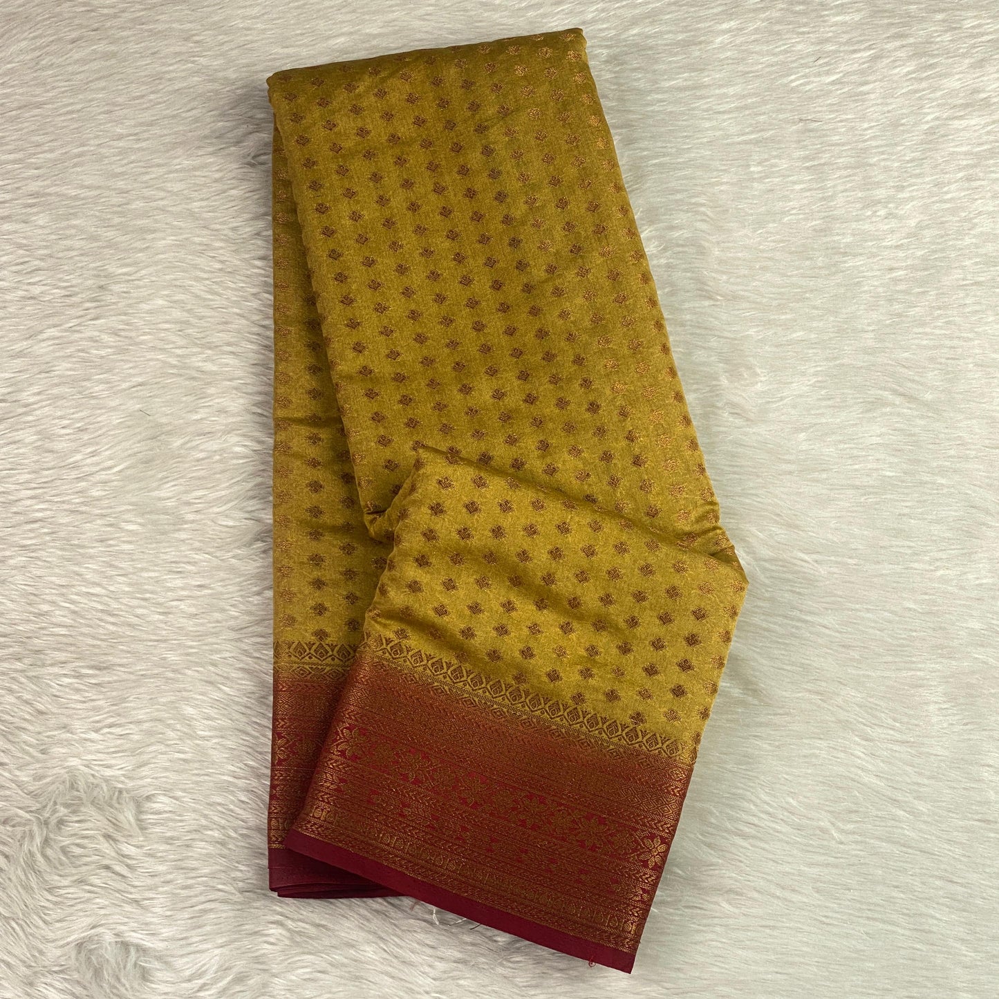 Sheena Olive Green Georgette Saree with Zari Butta & Contrast Border