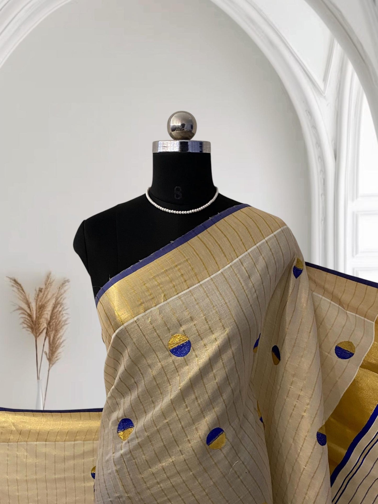 Shobana Uthradam Tissue Kerala Saree with Golden Lines and Butta work Green