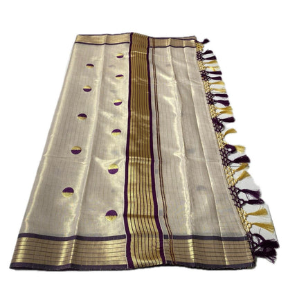 Shobana Uthradam Tissue Kerala Saree with Golden Lines and Butta work Purple