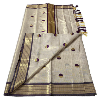 Shobana Uthradam Tissue Kerala Saree with Golden Lines and Butta work Purple