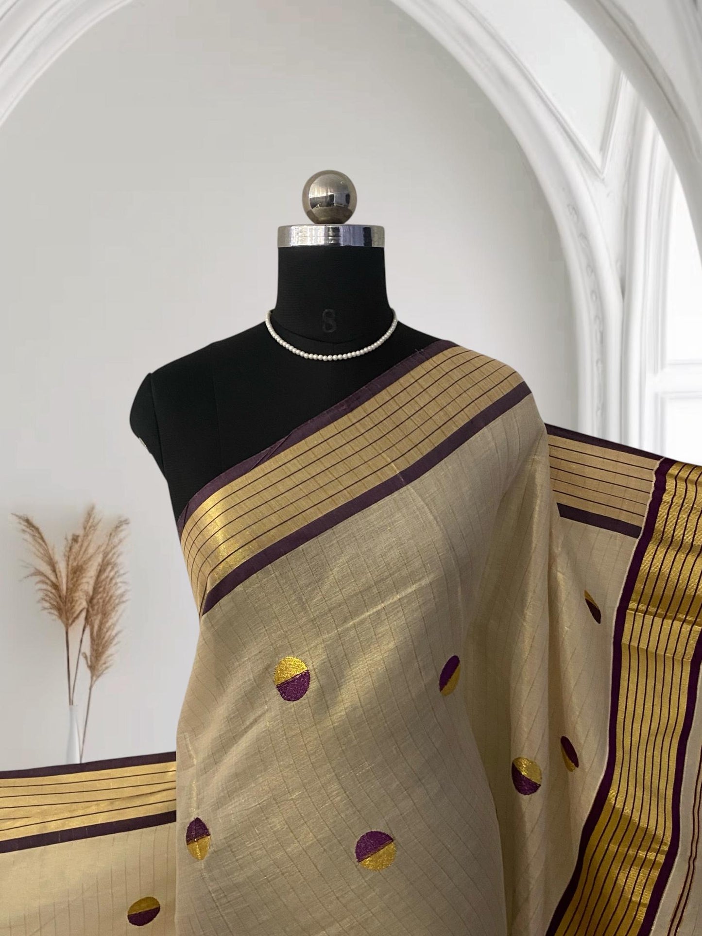 Shobana Uthradam Tissue Kerala Saree with Golden Lines and Butta work Purple