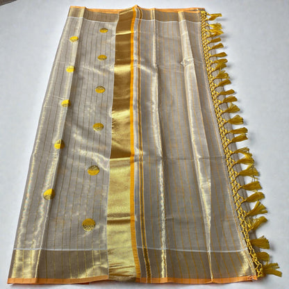 Shobana Uthradam Tissue Kerala Saree with Golden Lines and Butta work Yellow