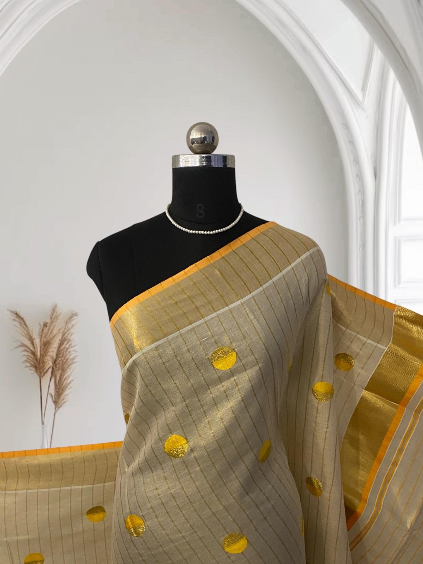 Shobana Uthradam Tissue Kerala Saree with Golden Lines and Butta work Yellow