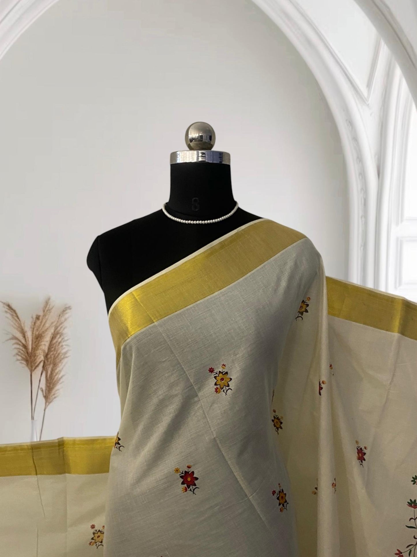 Radhika Floral Cotton Kasavu Saree