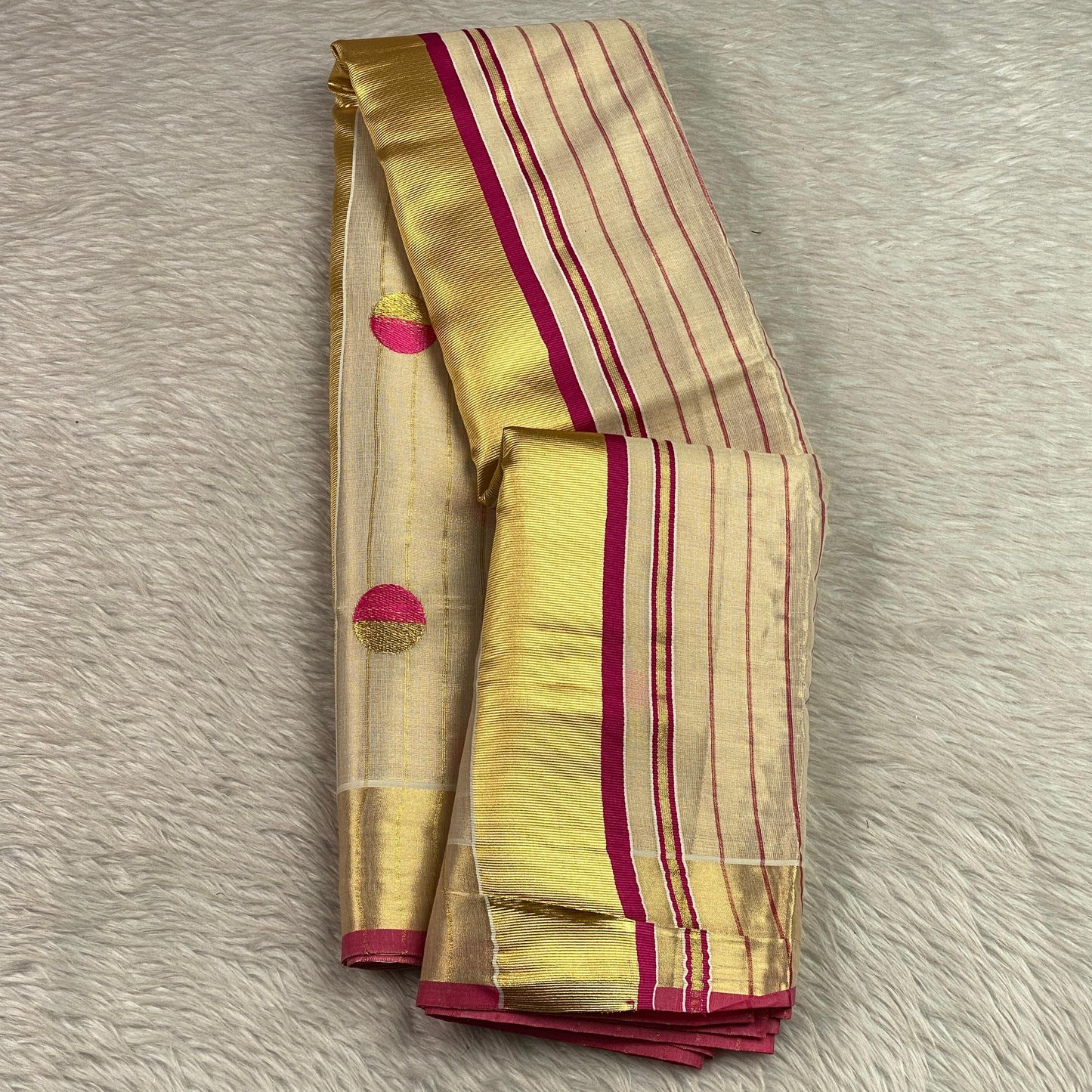 Shobana Uthradam Tissue Kerala Saree with Golden Lines and Butta work Pink