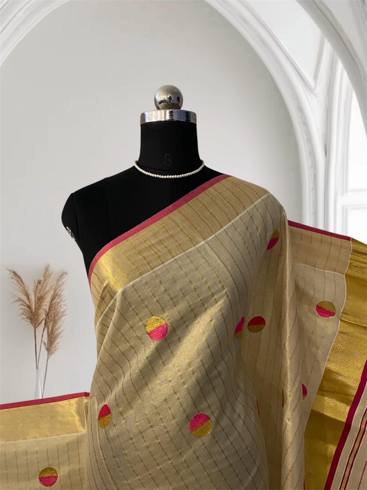 Shobana Uthradam Tissue Kerala Saree with Golden Lines and Butta work Pink