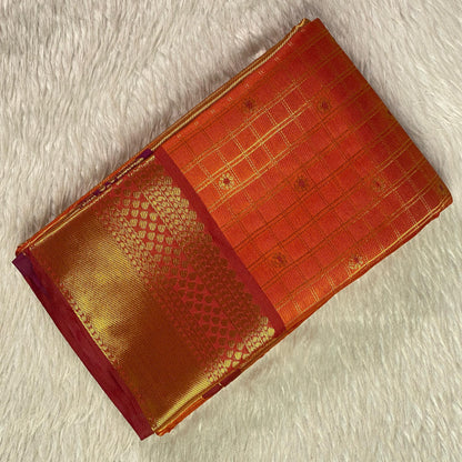 Krithika Rust Orange Checked Saree with Rich Zari Border