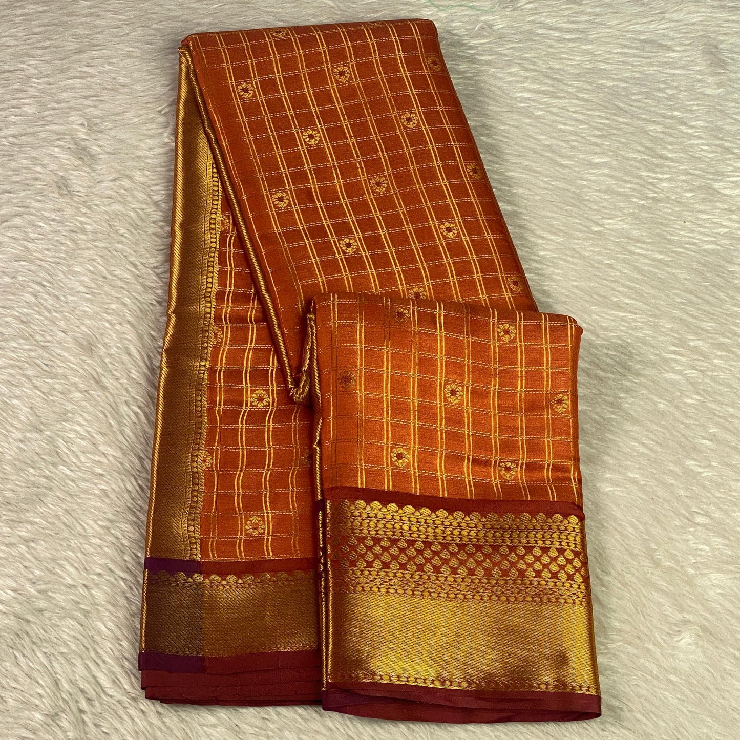 Krithika Rust Orange Checked Saree with Rich Zari Border