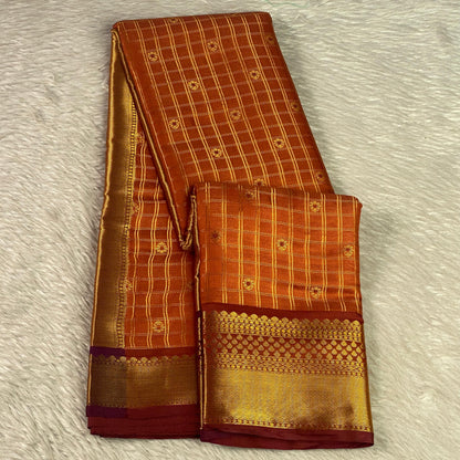 Krithika Rust Orange Checked Saree with Rich Zari Border