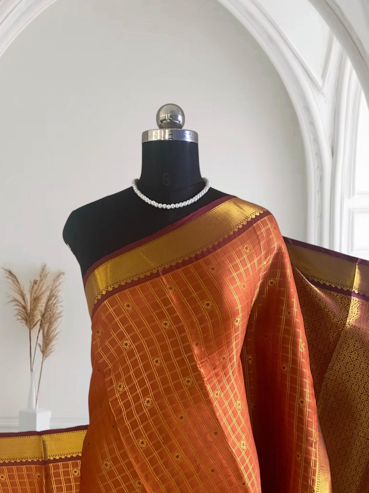 Krithika Rust Orange Checked Saree with Rich Zari Border