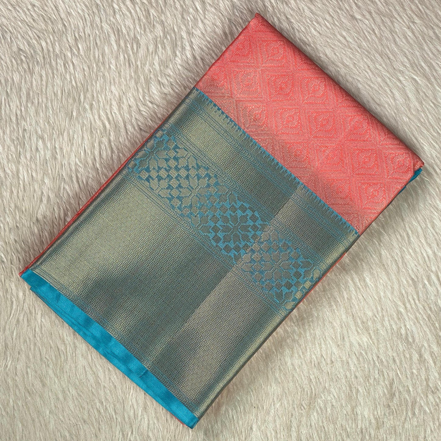 Devanshi – Premium Orange Silk Saree with Rich Blue Zari Border