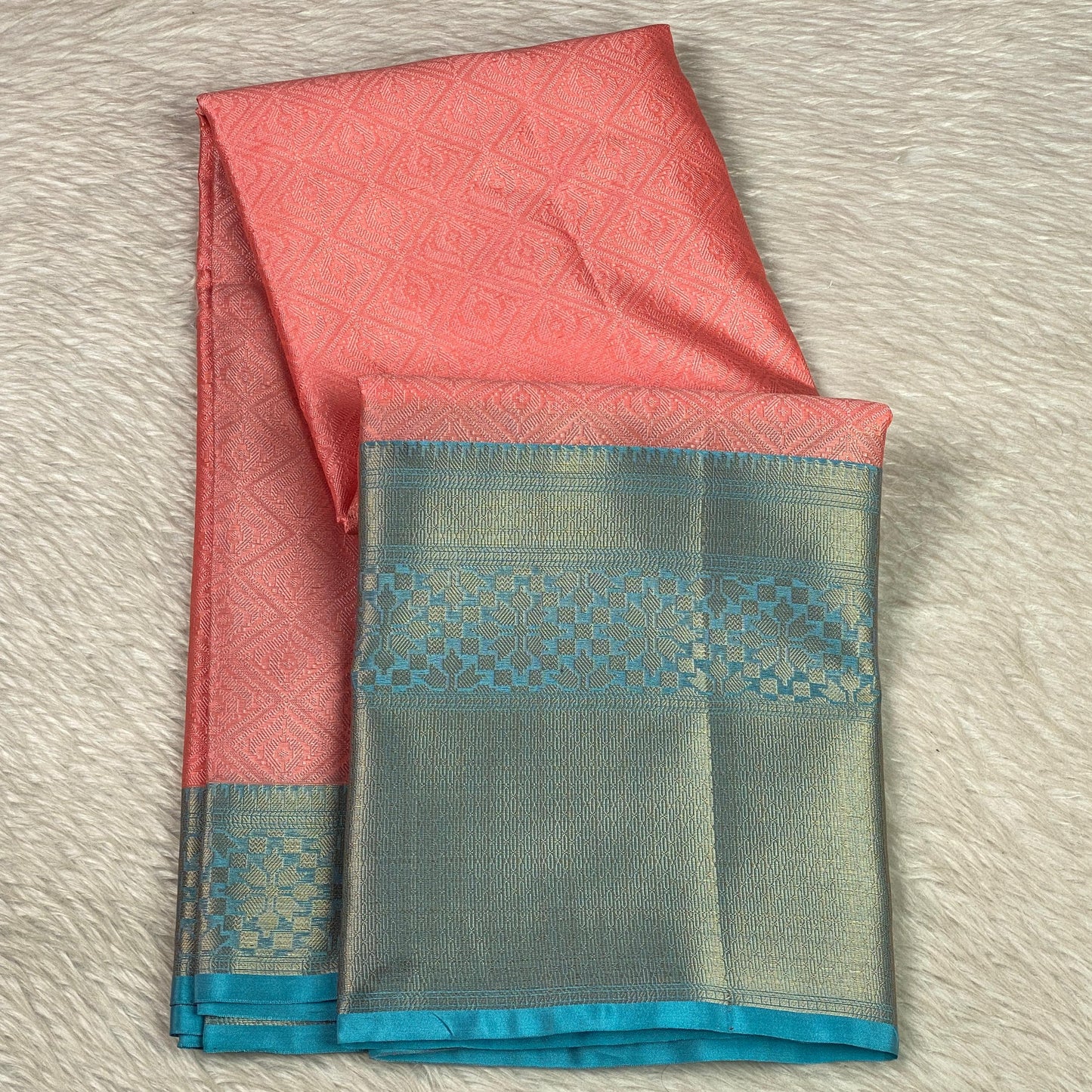 Devanshi – Premium Orange Silk Saree with Rich Blue Zari Border