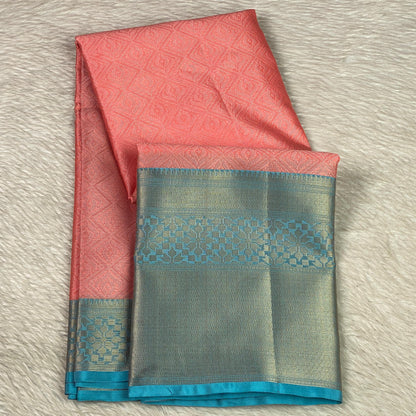 Devanshi – Premium Orange Silk Saree with Rich Blue Zari Border