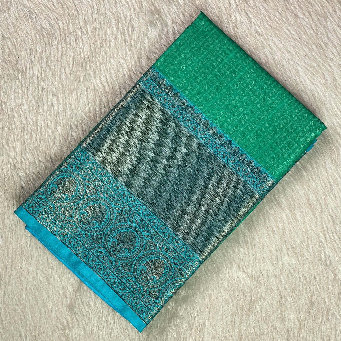 Devanshi – Premium Green Silk Saree with Rich Blue Zari Border