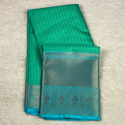 Devanshi – Premium Green Silk Saree with Rich Blue Zari Border