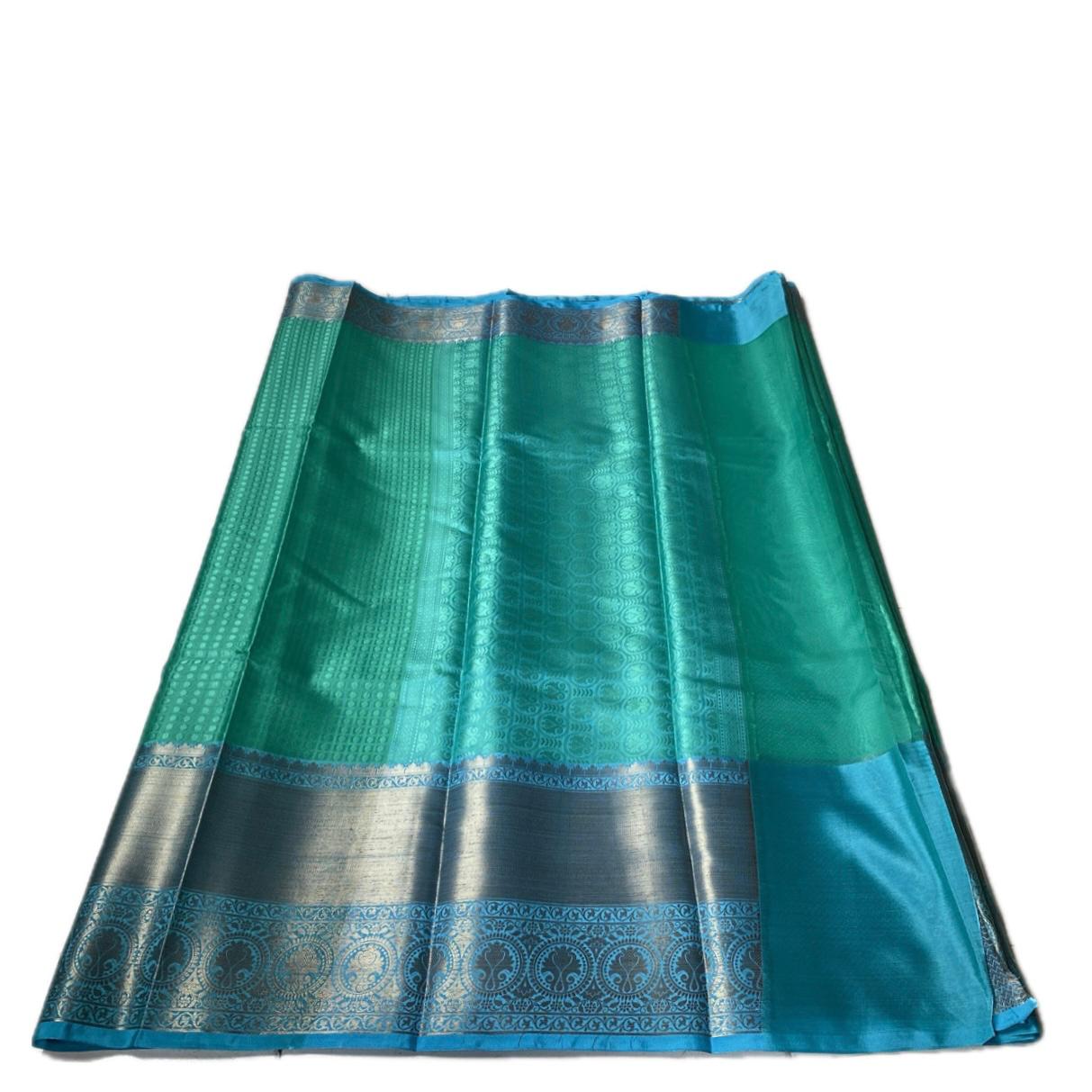 Devanshi – Premium Green Silk Saree with Rich Blue Zari Border