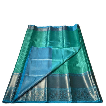 Devanshi – Premium Green Silk Saree with Rich Blue Zari Border