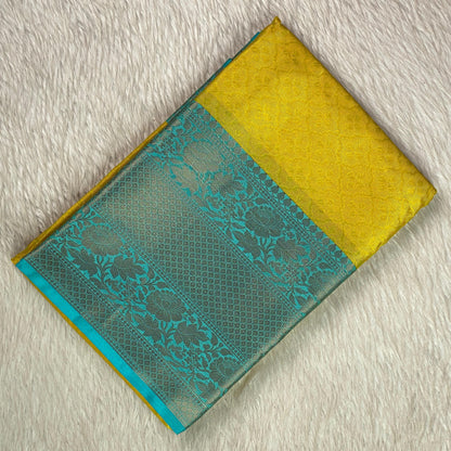 Devanshi – Premium Yellow Silk Saree with Rich Blue Zari Border