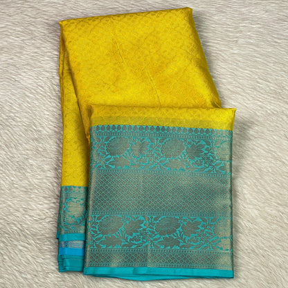 Devanshi – Premium Yellow Silk Saree with Rich Blue Zari Border
