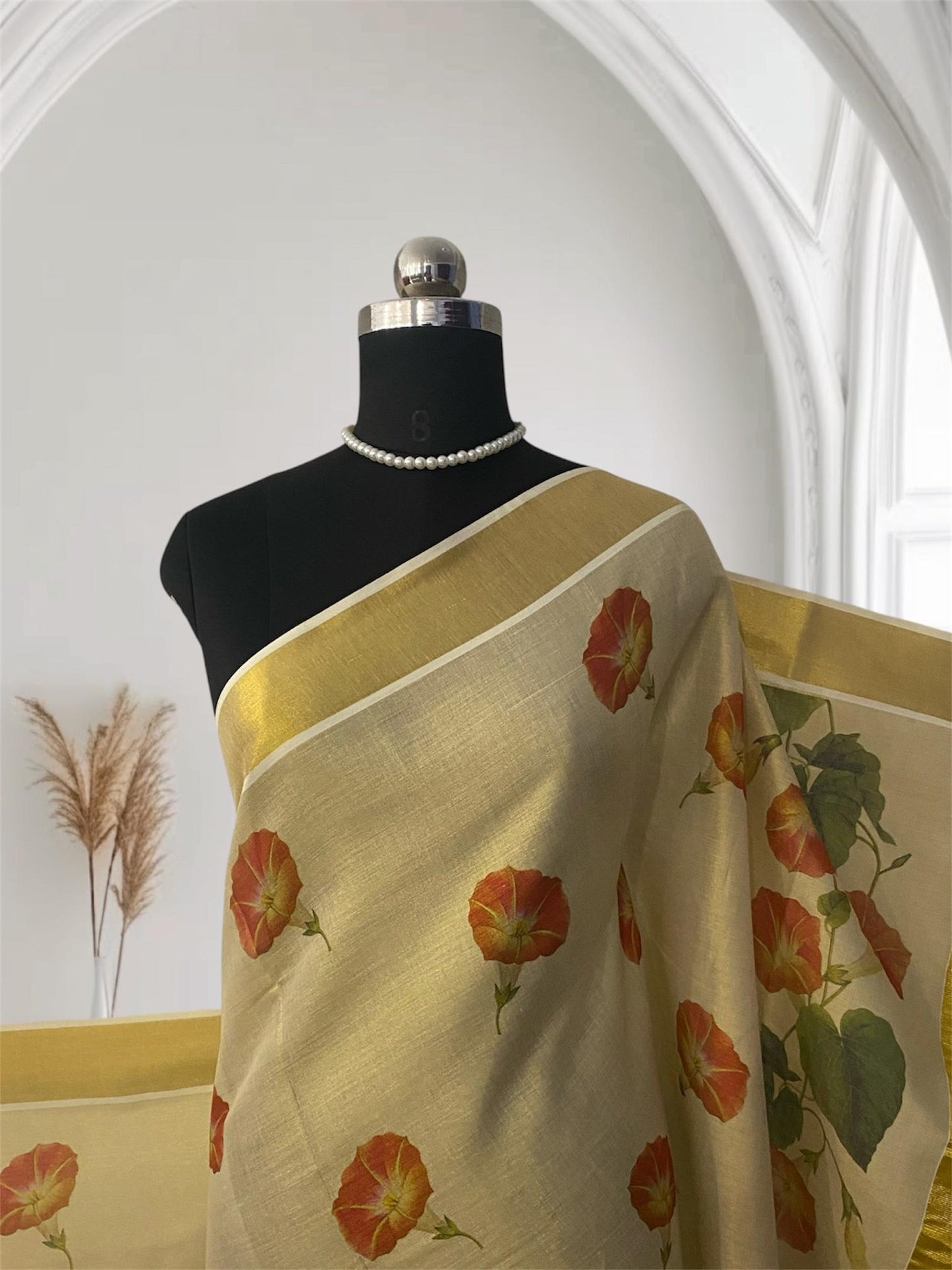 Vismaya Plain with Floral Tissue Kerala Saree