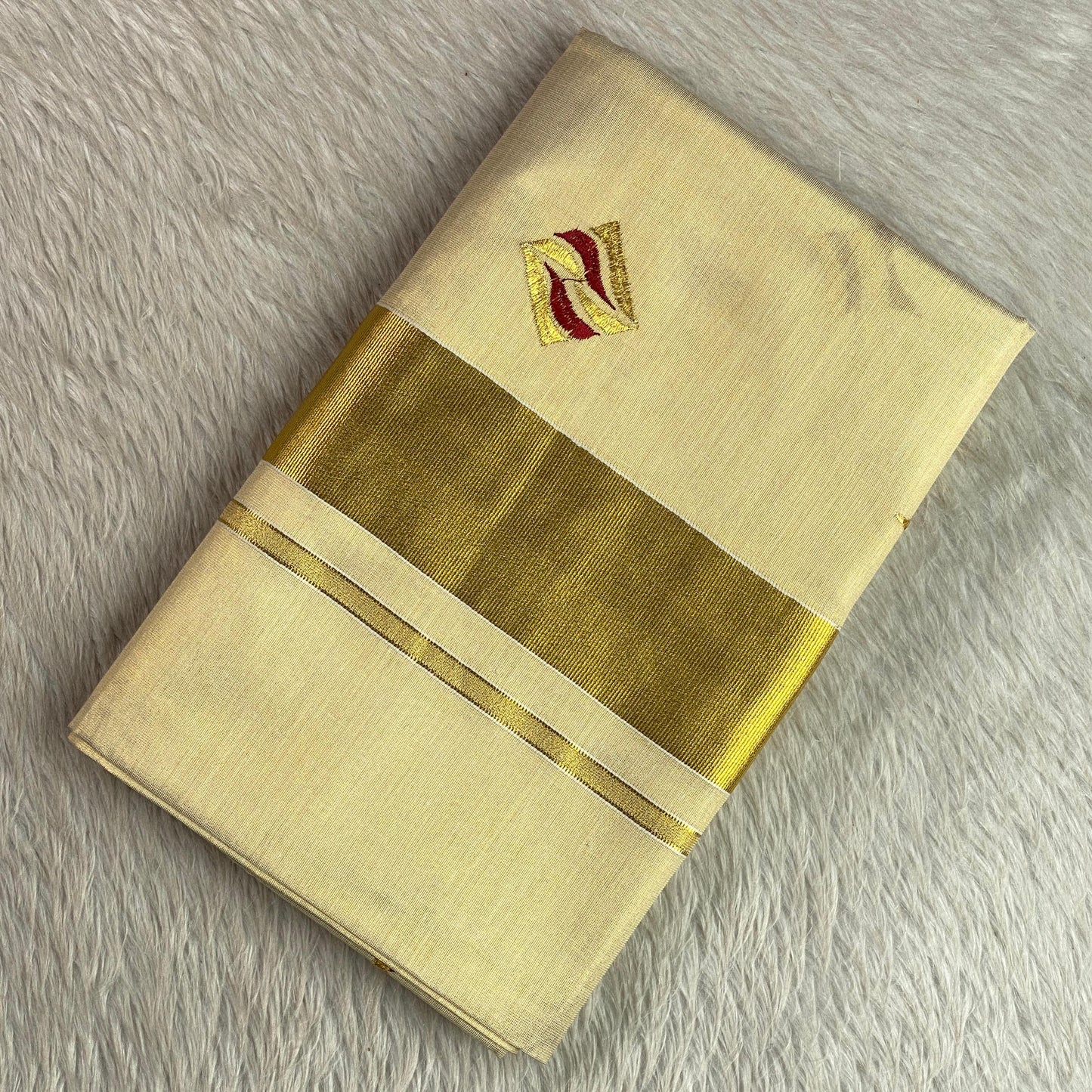 Kerala Tissue Saree with Golden Zari Border & Butterfly Motifs Maroon