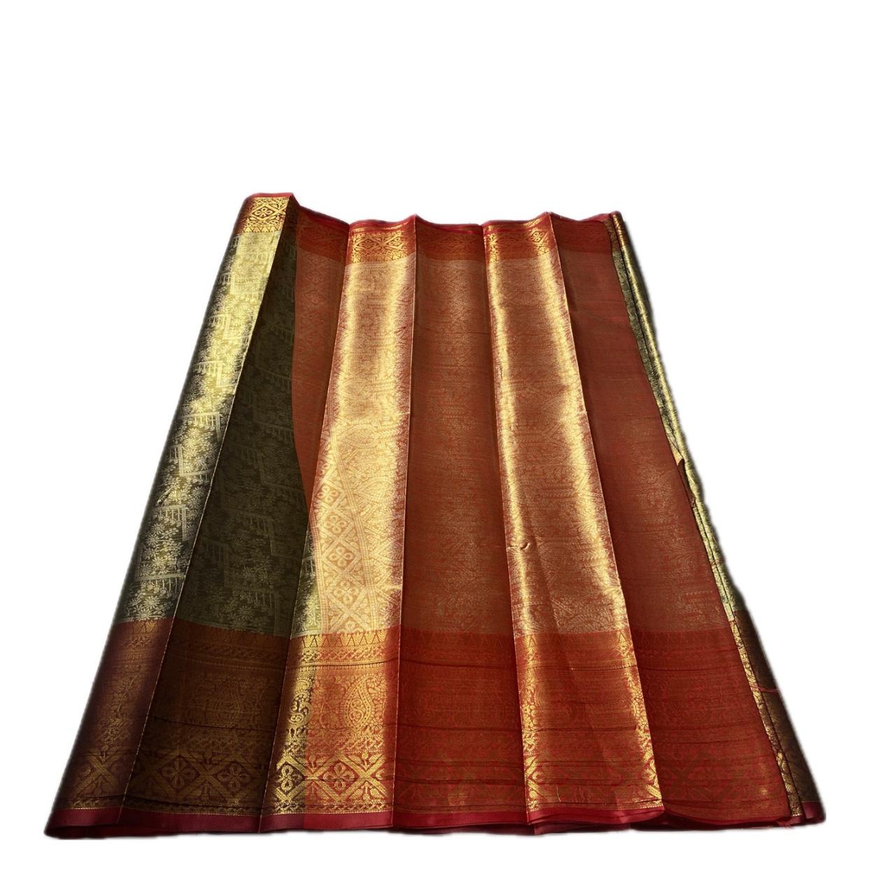 Panchali  Warm Golden Glow Brocade Semi Silk saree in Green
