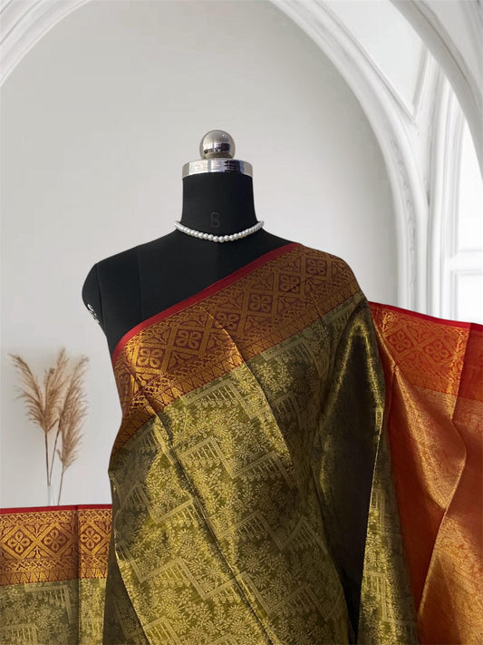 Panchali  Warm Golden Glow Brocade Semi Silk saree in Green