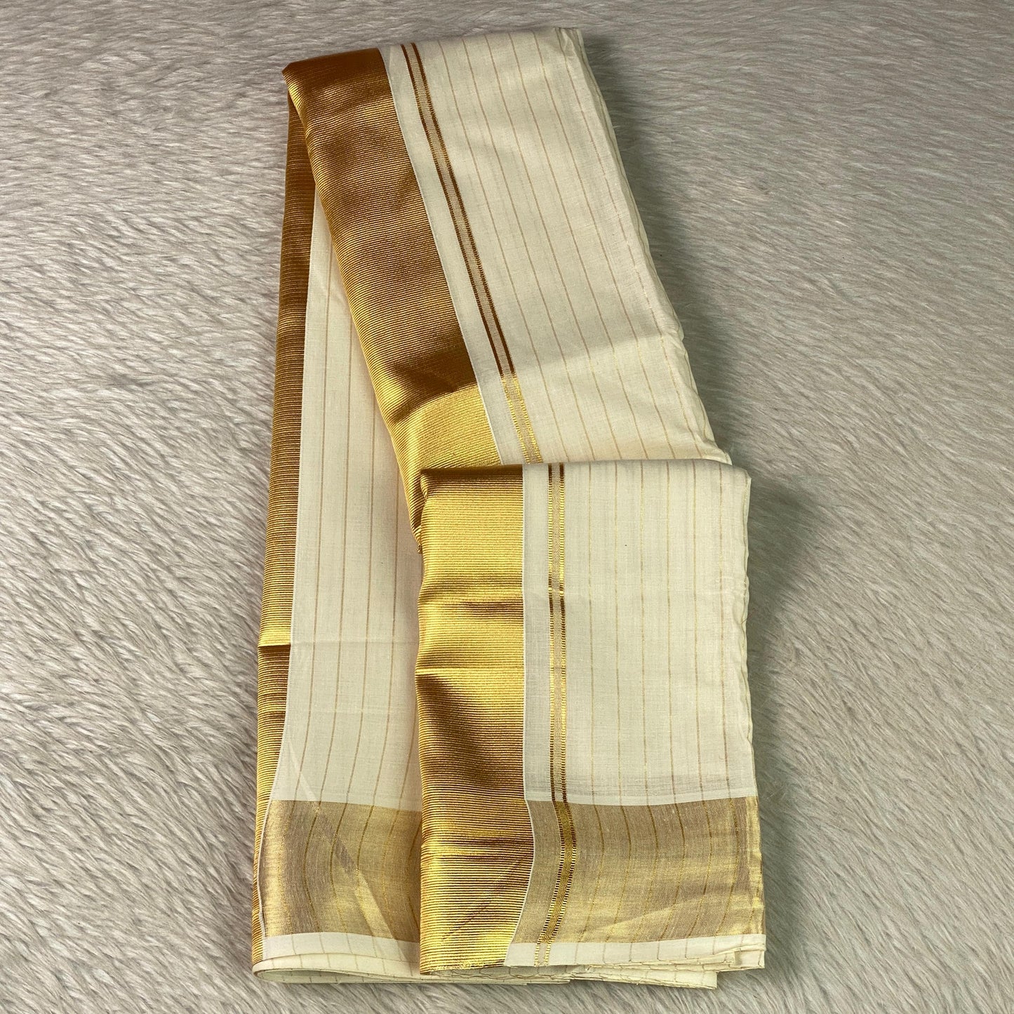Off-White Cotton Striped Kerala Saree with Gold Zari Border & Red Tassels