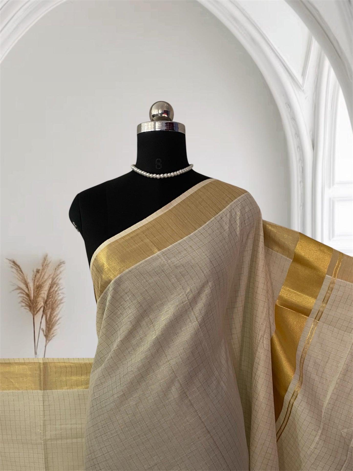 Off-White Cotton Checkered Kerala Saree with Gold Zari Border & Green Tassels
