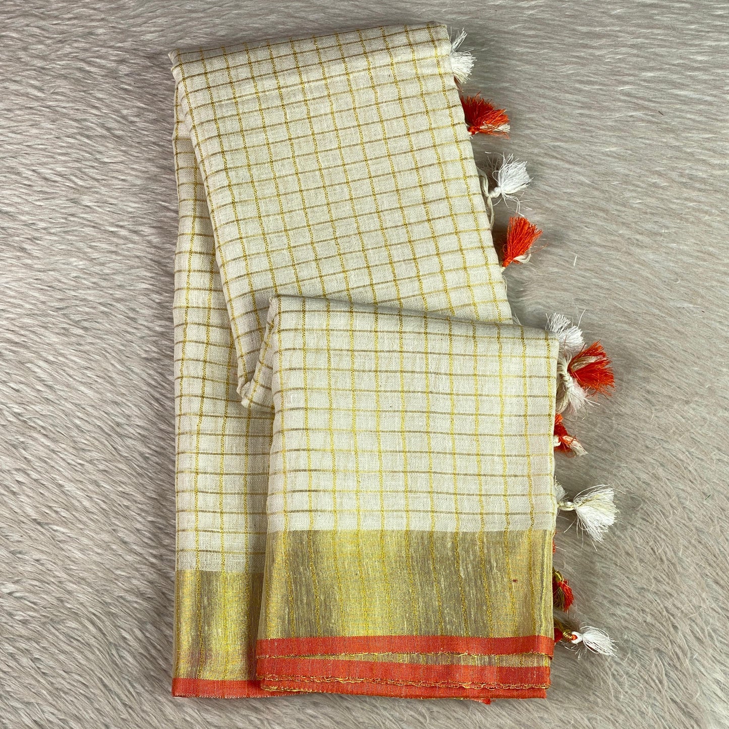 Kannaki Semi Linen Jute Saree with Orange Zari Border