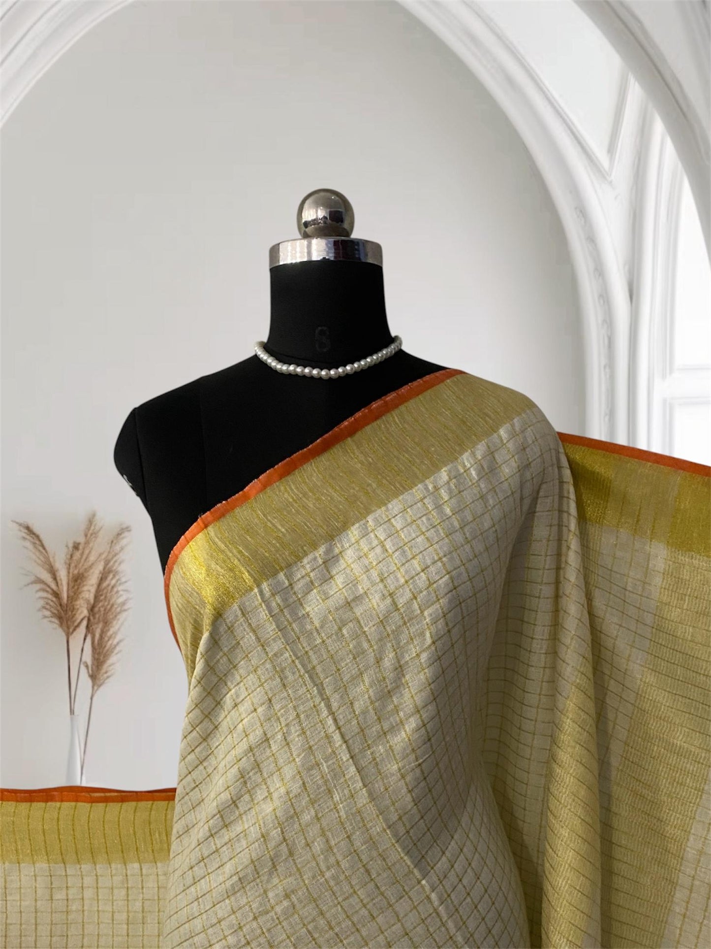 Kannaki Semi Linen Jute Saree with Orange Zari Border