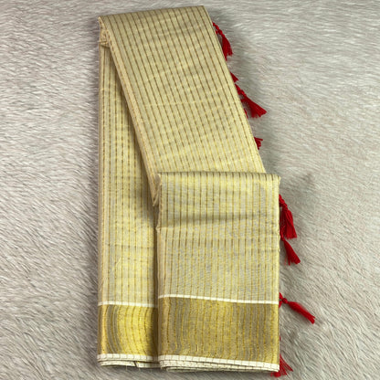 Tissue Kerala Saree with Stipes and Red Tassels