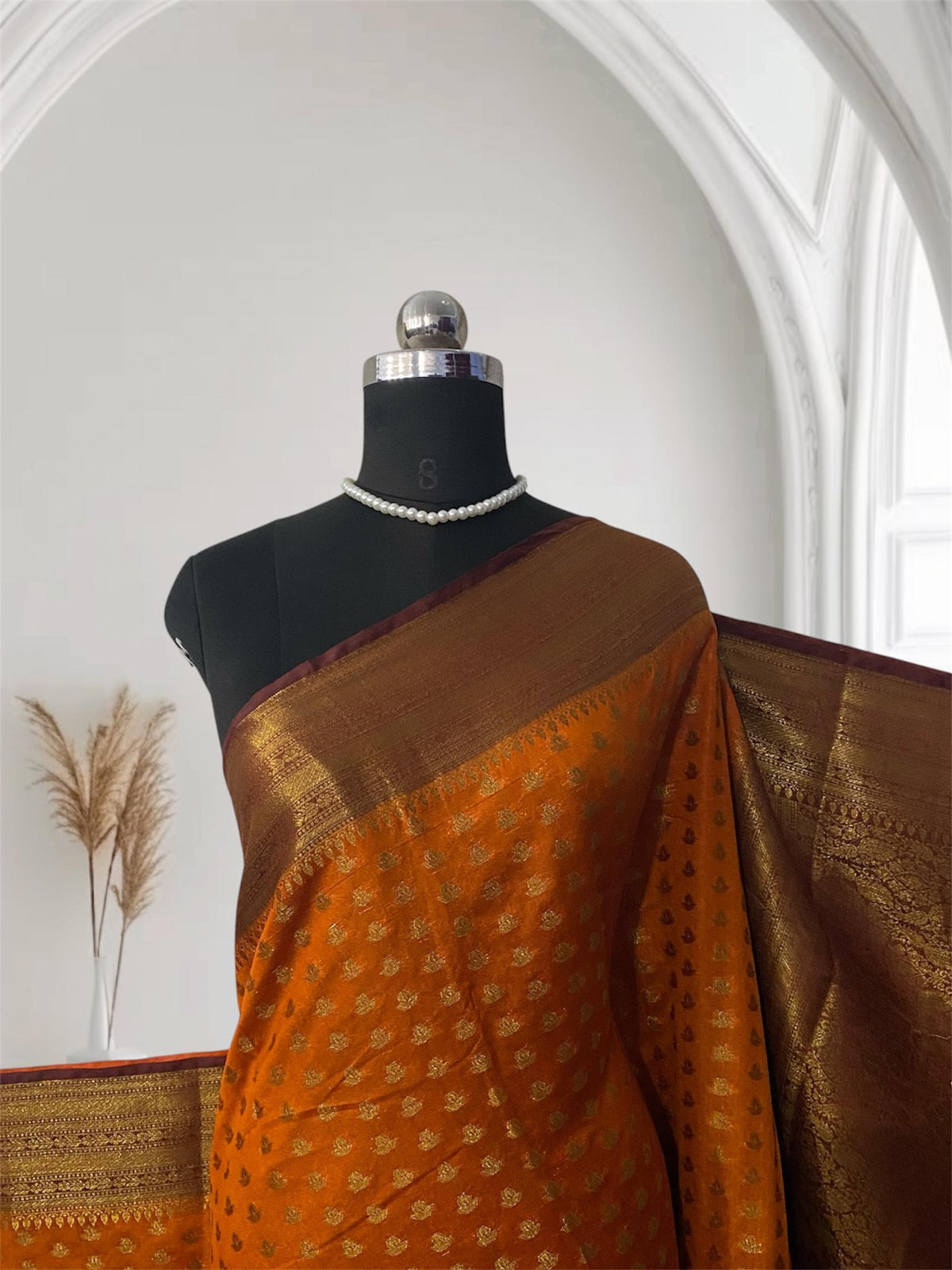Aami  Georgette Banarasi Saree with Classic Butta Saree Orange