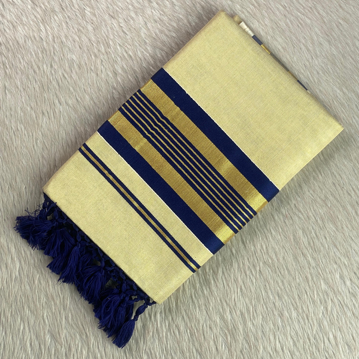 Vyshnavi Golden Tissue saree with Blue Striped Border